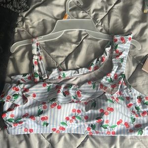This is a cherry swimsuit top from Belk